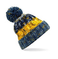 Corkscrew pom pom beanie