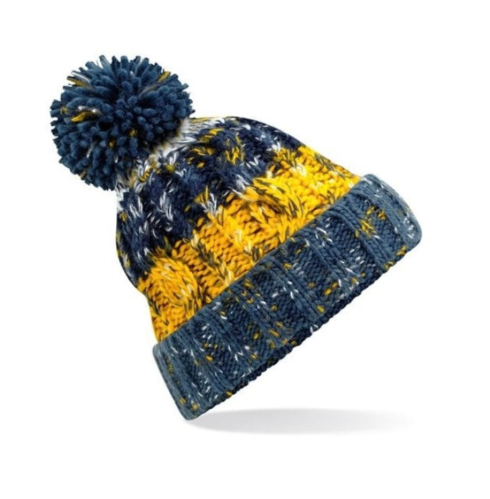 Corkscrew pom pom beanie